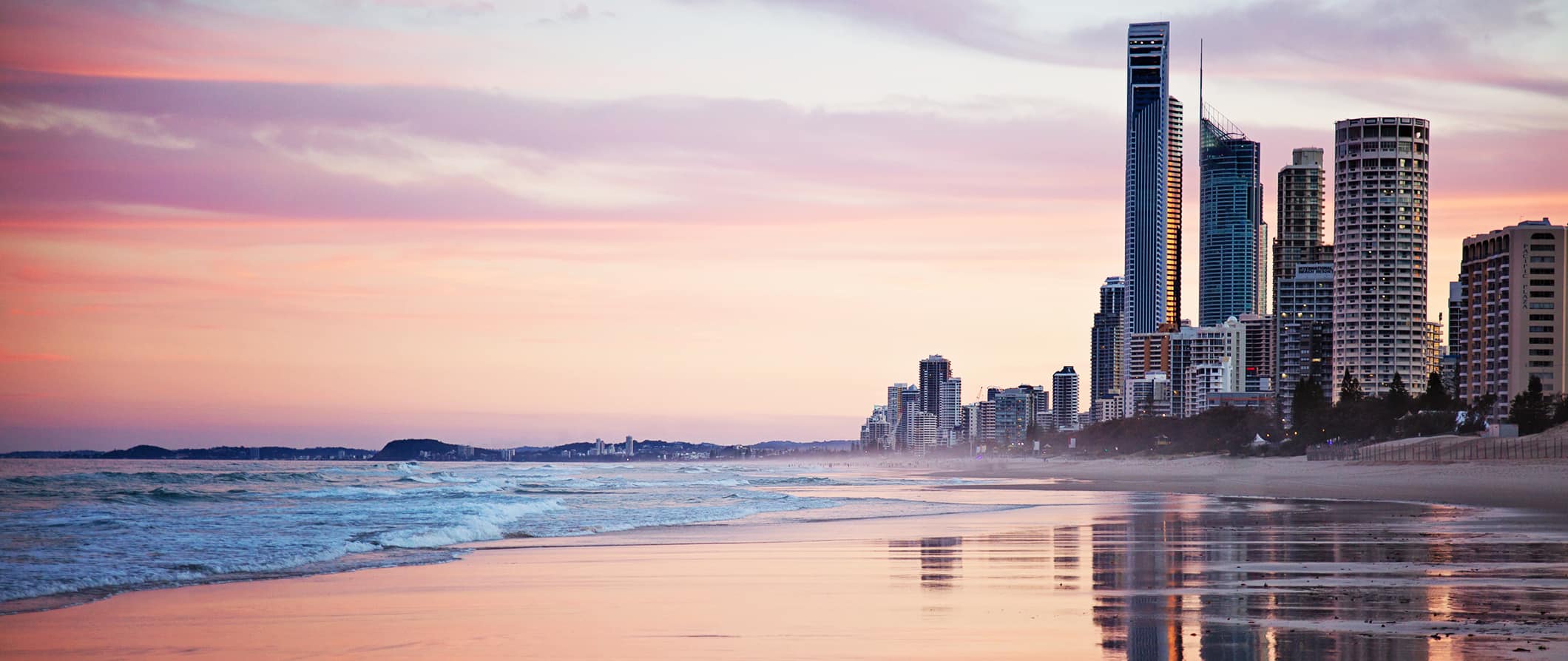 Towering buildings along the Gold Coast in Australia at sunrise