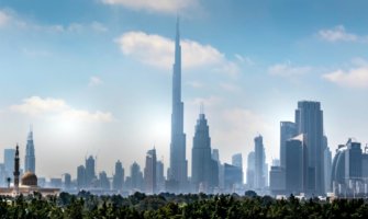 The towering skyline of downtown Dubai, including he massive Burj Khalifa