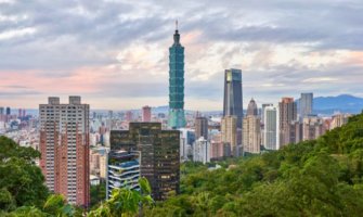The skyline of Taipei in Taiwan, surrounded by greenery